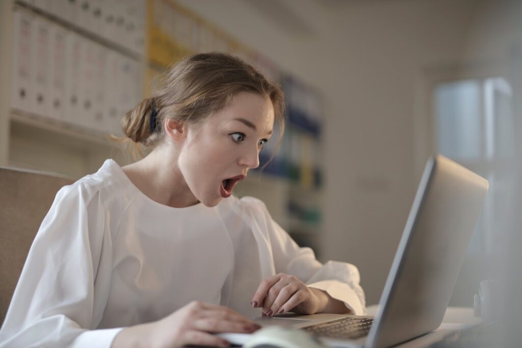 Woman-shocked-reading-computer